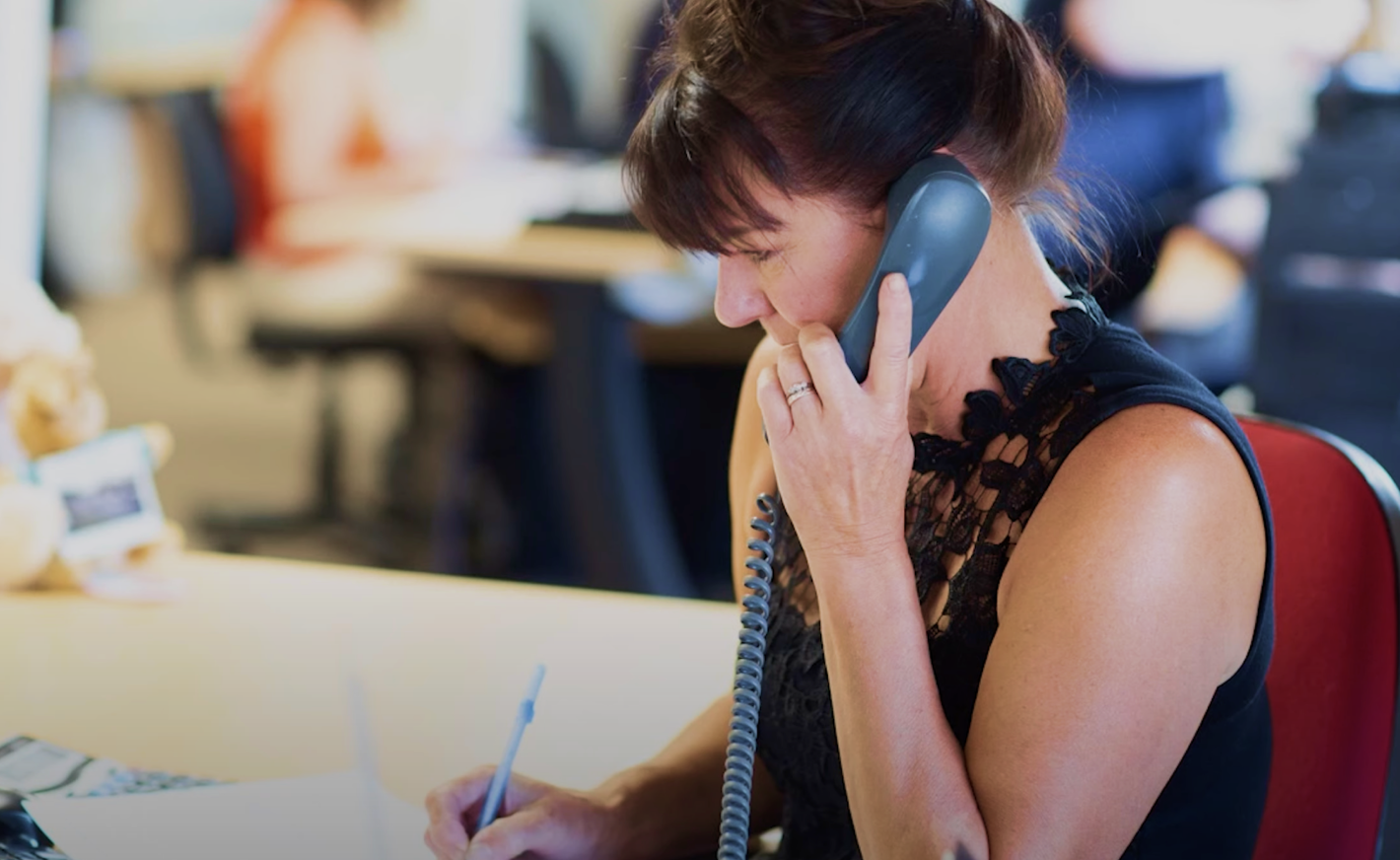 Staff member using the phone